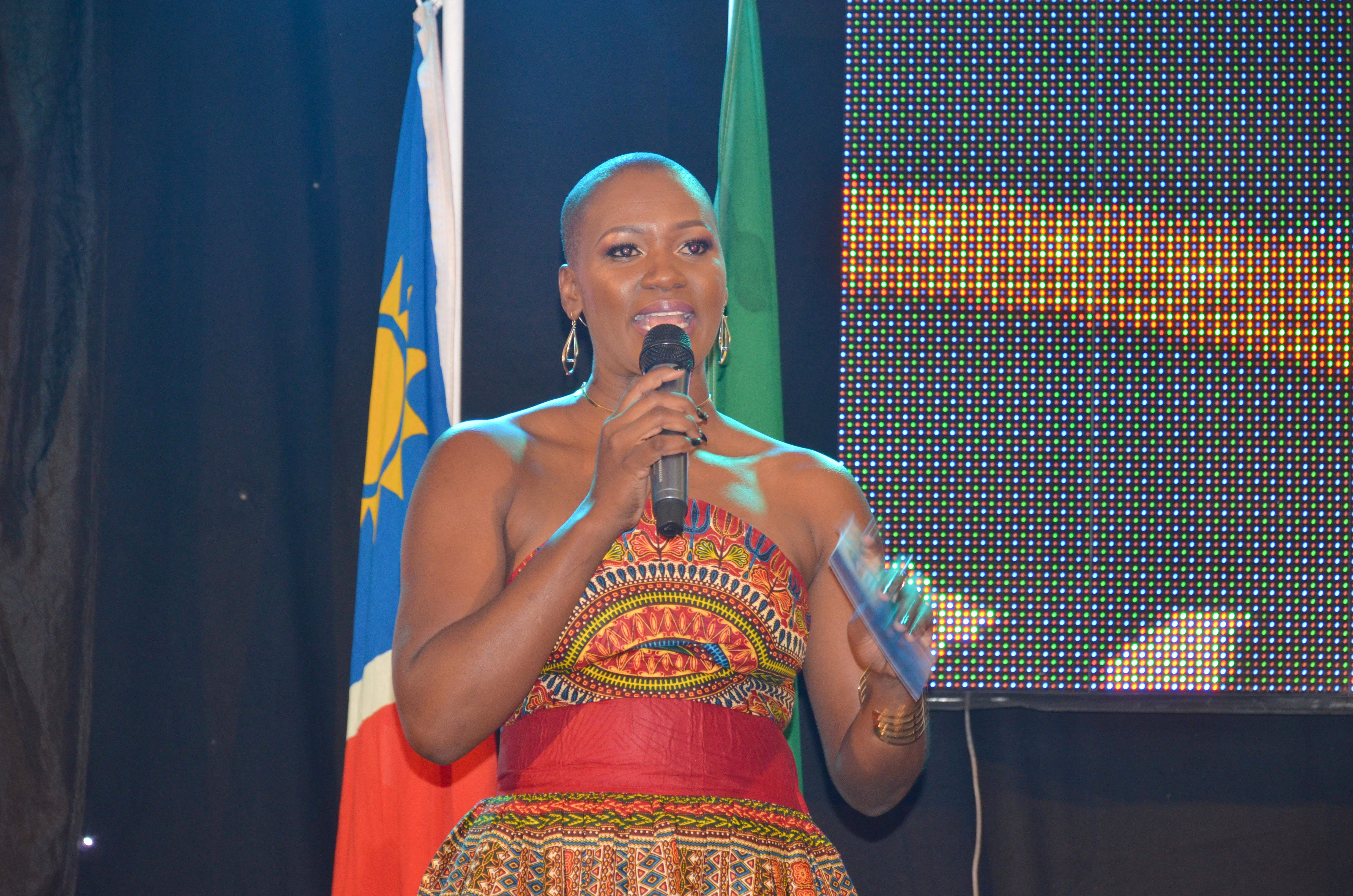 Lorraine presenting at a formal event