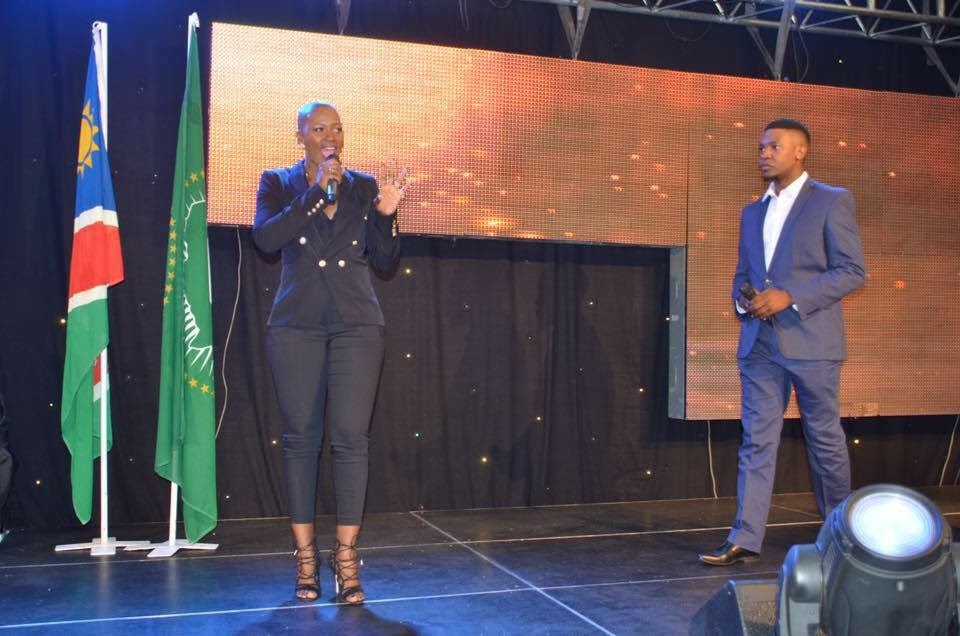 Lorraine interviewing a guest on stage