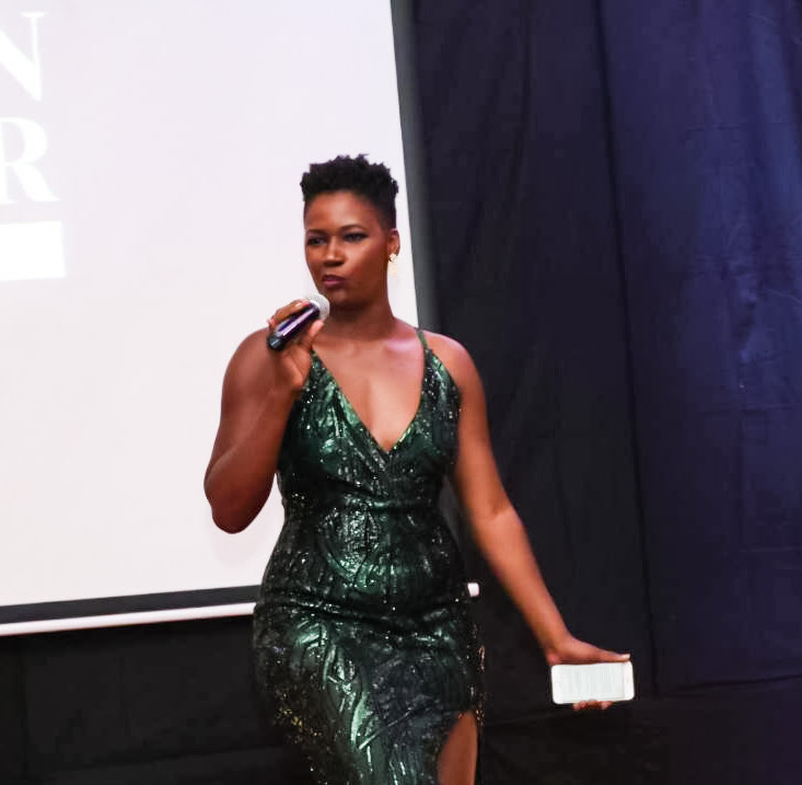 Lorraine speaking at an awards event