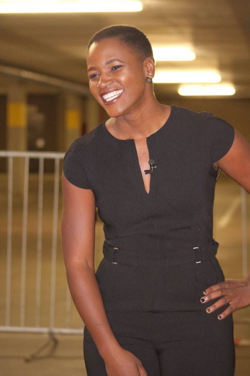 Lorraine Kondombolo smiling during a television presentation