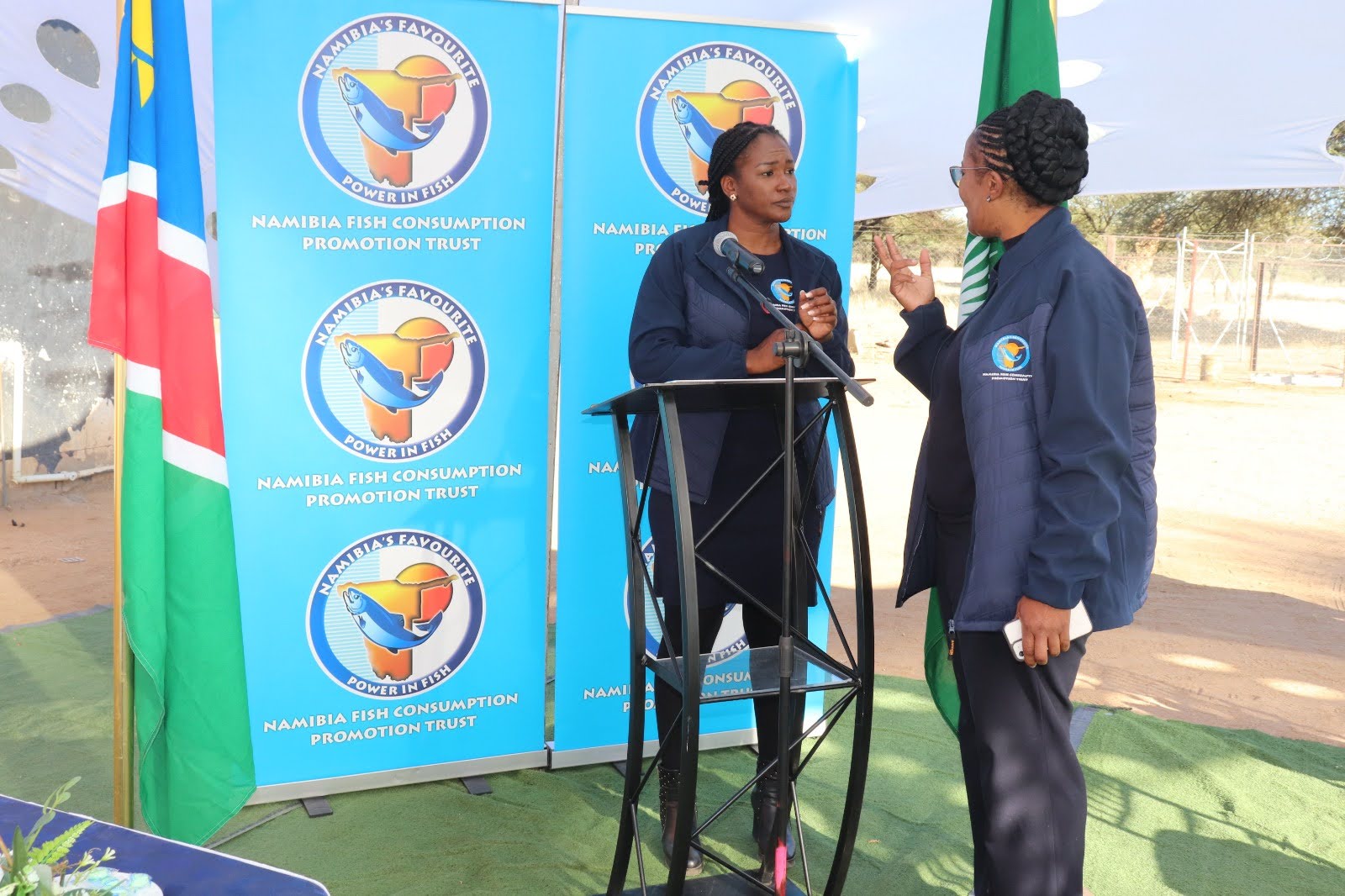 Lorraine Kondombolo speaking at a public stakeholder engagement